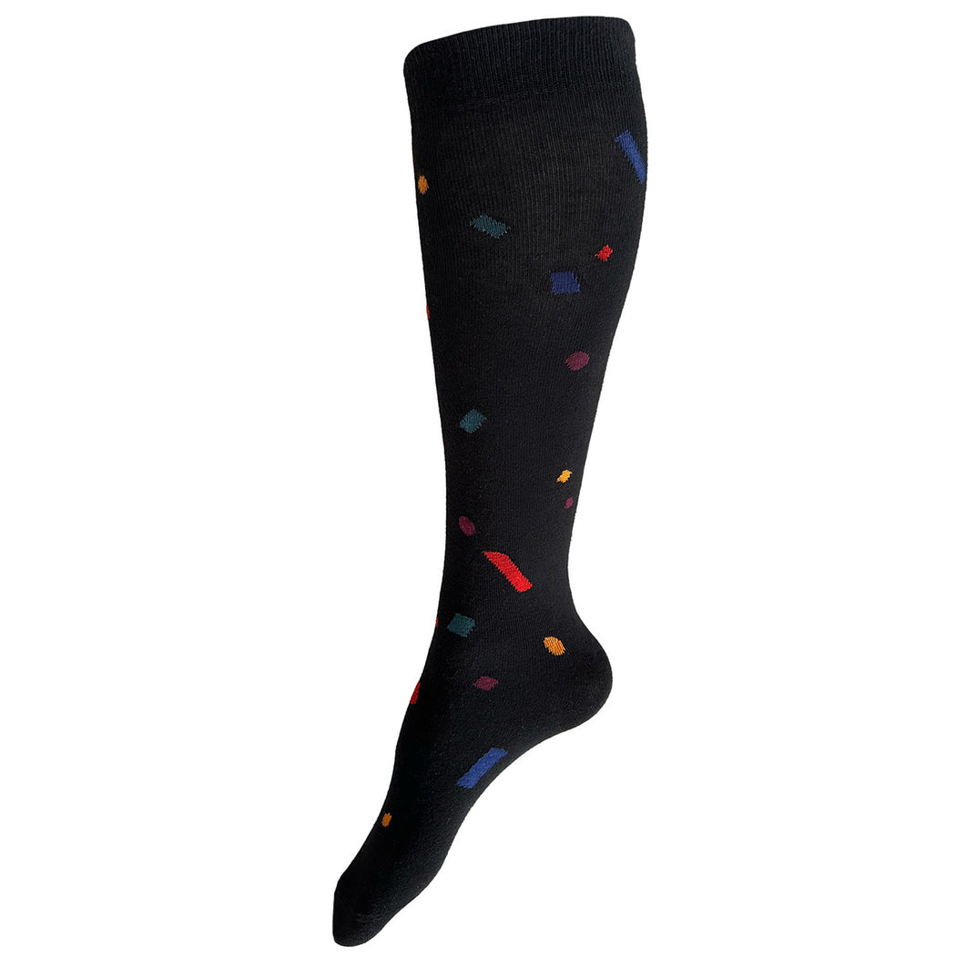 Made in USA women's black cotton knee/boot socks with fun confetti pattern in red, blue, yellow, and dark green by THIS NIGHT